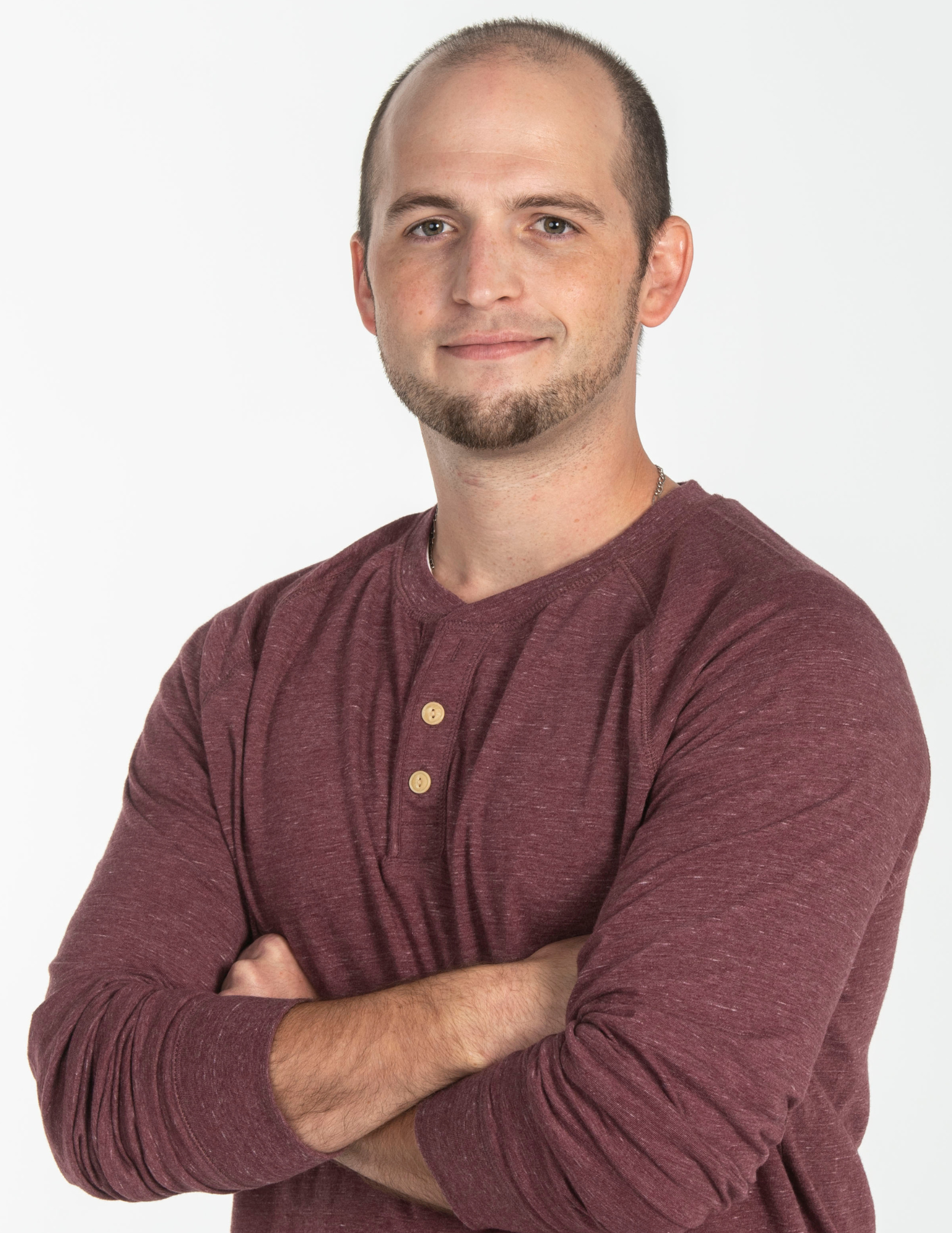 confident student posing for headshot